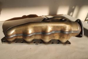 17789386 – 077253034Q – Uitlaatspruitstuk