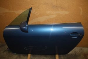 17799410 – 8N0831051C – Portier 2Deurs links